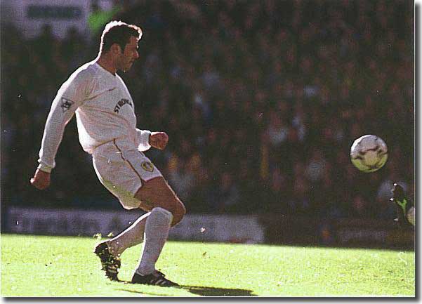 Viduka clips his first goal over Westerveld after Smith's chase earned the error