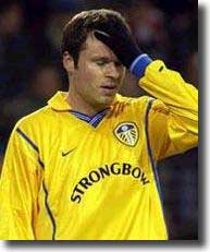 Mark Viduka has that sinking feeling as Leeds miss another chance in the away match at PSV Eindhoven