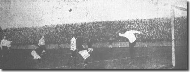 Bower, the Clapton Orient keeper, hoofs the ball clear during the City win at the beginning of December