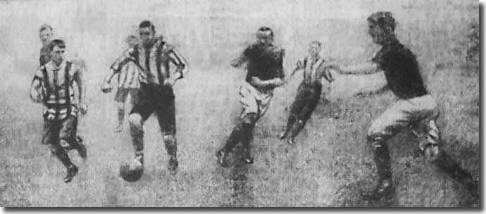 Brewis is about to score for Lincoln City on 26 October 1907 despite the chasing down of Tom Hynds in the centre