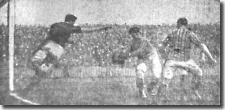Goalkeeper Tom Naisby prepares to set Leeds City in motion after securing the ball against Oldham in January 1909