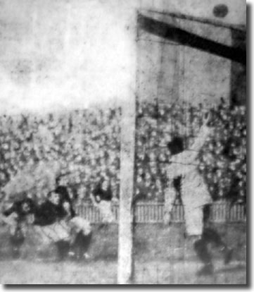 Goalkeeper Tony Hogg watches as Barnsley's Lillycrop wastes an opening in the match at Elland Road in April 1911