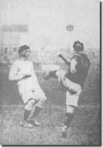 Alec Creighton clears from a Huddersfield forward in the Elland Road derby 7 October 1911