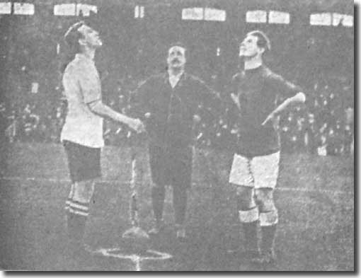 New City skipper Evelyn Lintott and referee Pellowe watch as Fulham captain Mavin tosses at the start of the opening match of the season at Craven Cottage on 7 September 1912