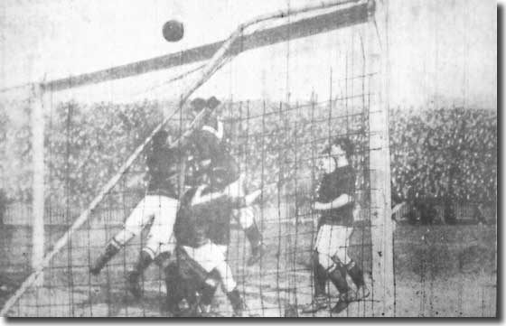 Woolwich Arsenal keeper Lievesley defends his goal during a City attack on 11 April