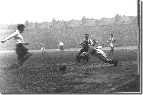 Goalkeeper Bill Johnson saves as Tottenham attack at White Hart Lane on December 19 1925.  Leeds lost the match 3-2