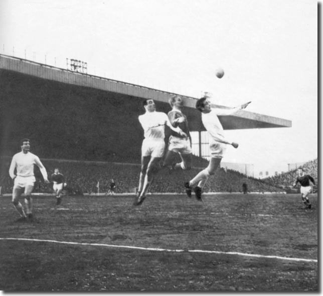 Willie Bell and Norman Hunter hold Everton at bay in January 1964, with Paul Madeley in close attendance