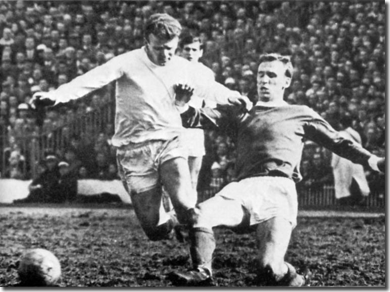 Pat Crerand gets the better of Billy Bremner on this particular occasion