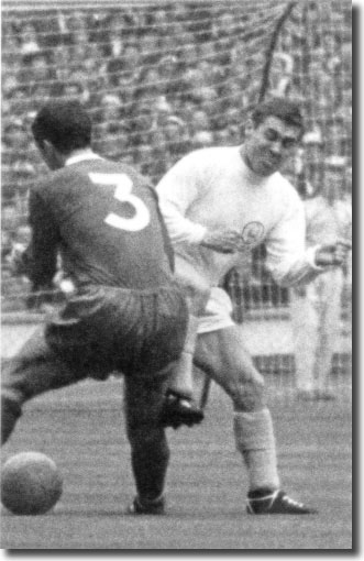 Bobby Collins crashes into Liverpool's Gerry Byrne, dislocating the full-back's shoulder during the 1965 FA Cup final