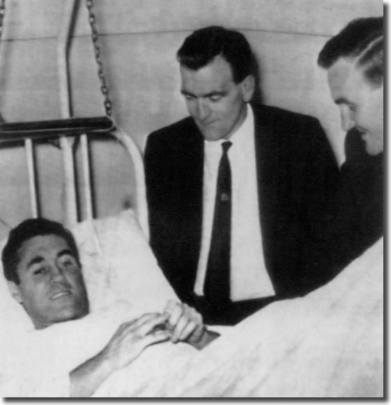 Les Cocker and Don Revie visit Collins in a hospital bed as he recovers from his broken thigh