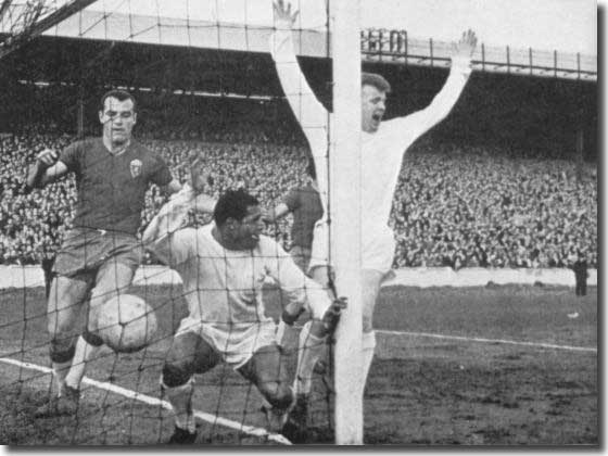 Billy Bremner celebrates as scorer Albert Johanneson ends up in the Zaragoza net in the second leg of the Fairs Cup semi final on 27 April 1966