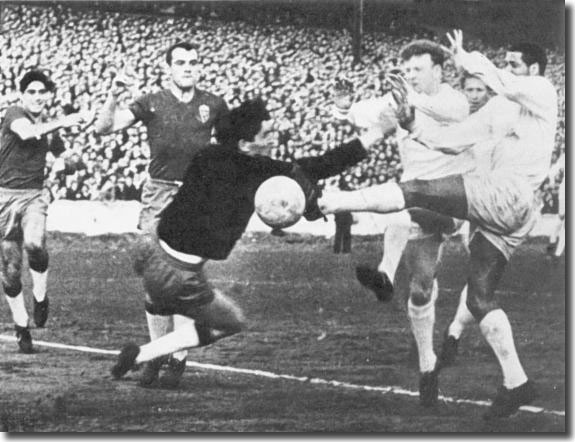 Albert Johanneson scores United's first goal against Real Zaragoza with Billy Bremner in close attendance