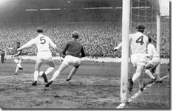 Marcellino opens the scoring for Zaragoza in the semi final play off at Elland Road with Charlton, Sprake, Bremner and Reaney helpless to stop him