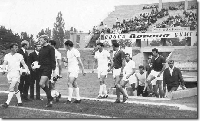 Billy Bremner leads out Gary Sprake, Paul Reaney, Eddie Gray, Norman Hunter and Mike O'Grady alongside the Dinamo team at the start of the first leg of the 1967 Fairs Cup final