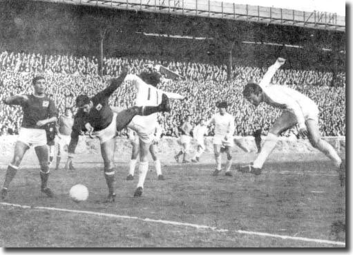 Mick Jones heads home against Forest in the Cup with Gray and Lorimer in attendance