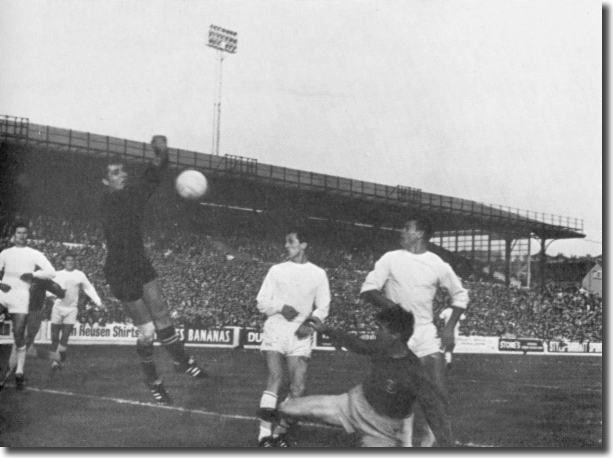 A grounded Jack Charlton puts pressure on the Ferencvaros goal