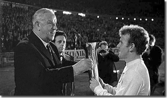 Sir Stanley Rous presents the trophy to a very proud Billy Bremner