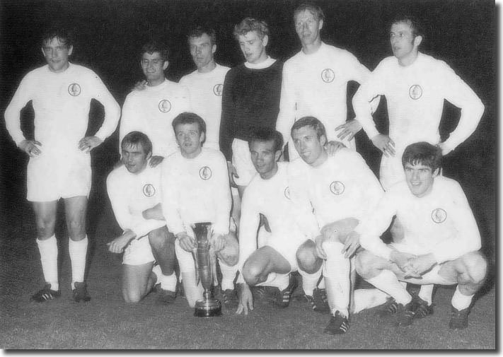 The United eleven that finished the game with Ferencvaros pose with the trophy - Back:Hunter, Bates, Madeley, Sprake, Charlton, O'Grady. Front: Cooper, Bremner, Reaney, Jones, Lorimer