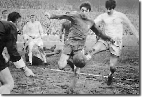 Bobby Tambling of Chelsea clears from Peter Lorimer during the Elland Road clash in February