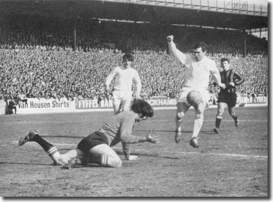 Johnny Giles is about to slip the ball past Manchester City keeper Joe Corrigan to win a vital game in early April