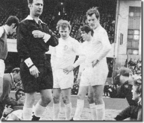 12 April 1969 - Gary Sprake, getting some treatment from Les Cocker, fears the worst as referee Ken Burns reaches for his book, but the keeper was only cautioned, despite laying Bobby Gould out with a punch