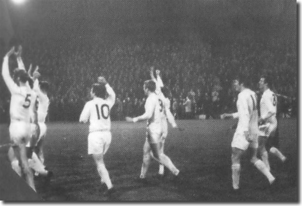 Victorious United players salute the fans after drawing at Anfield - Charlton, Reaney, Giles, Jones, Bremner, Gray, Madeley