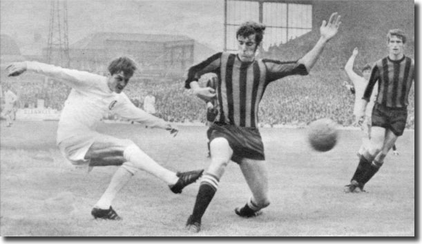 Tommy Booth cannot prevent Allan Clarke cracking a shot against the City bar