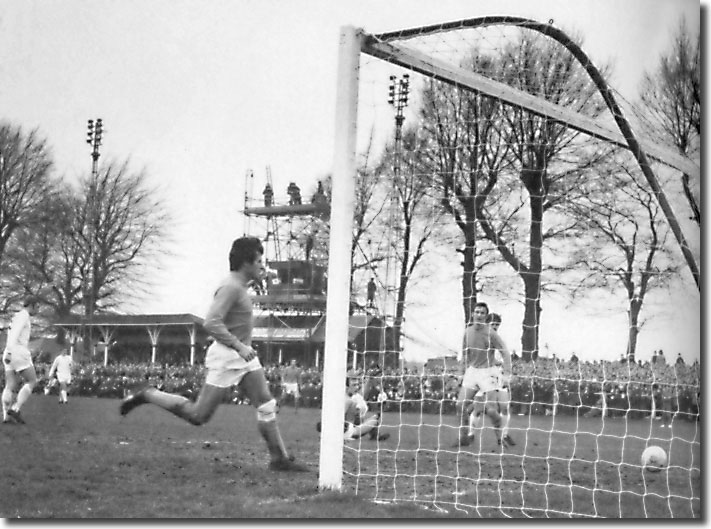 Peter Lorimer (hidden behind a Sutton defender in the centre) slides home United's fifth goal