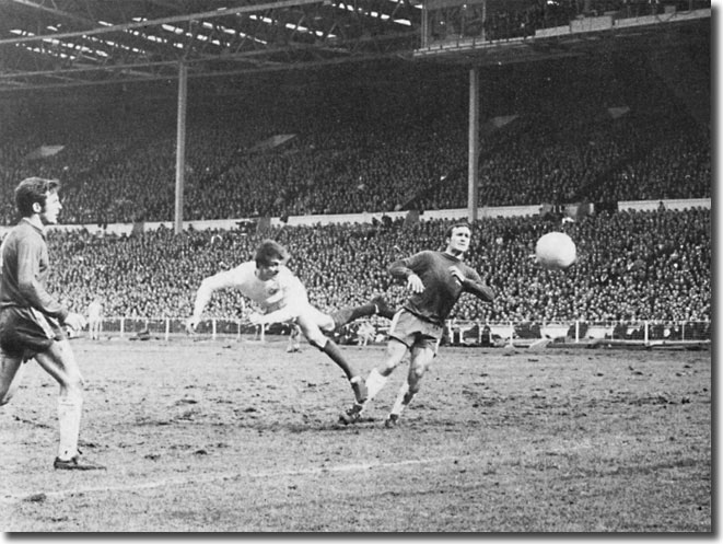 Allan Clarke twists into a header against Chelsea - the ball hit the upright but Mick Jones crashed home the rebound