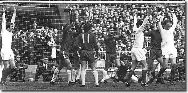 Jones and Lorimer celebrate with Charlton after the centre-half's header opens the scoring at Wembley