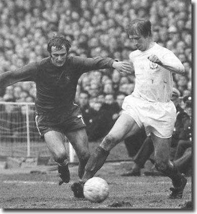 Jack Charlton shields the ball from Tommy Baldwin - the United defenders normally had the better of the opposition forwards