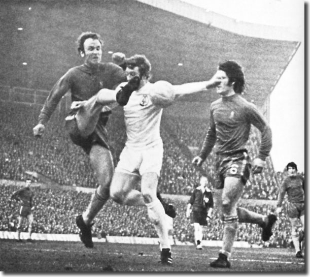 Mick Jones braves the pain of a Dempsey clearance with Webb in close attendance - the clash was typical of a physical encounter