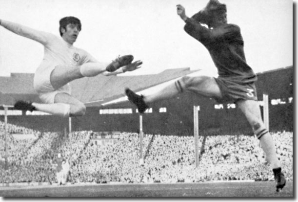 Eddie McCreadie can do nothing to prevent Peter Lorimer getting in a shot in the Cup final replay but it flashed over the bar