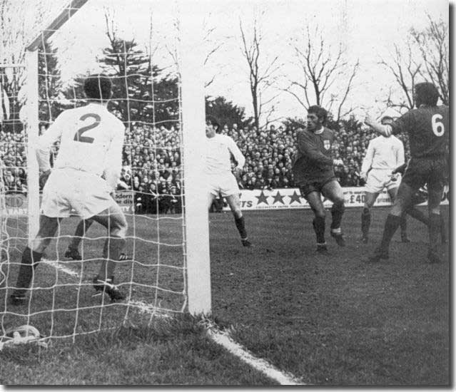 Ray Crawford heads Colchester into the lead