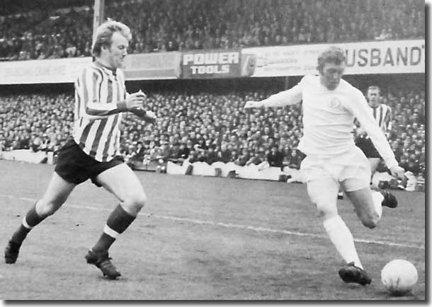 Mick Jones in action against Southampton's Jimmy Gabriel a couple of days earlier - Jones scored twice in United's 3-0 win at the Dell