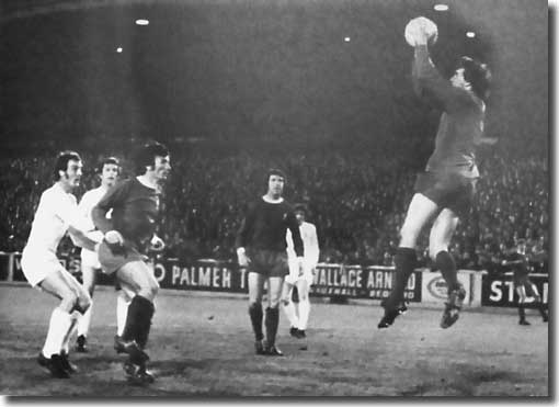 Paul Madeley is on hand but Liverpool keeper Ray Clemence saves confidently during the Fairs Cup semi final second leg on 28 April