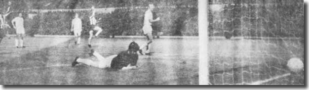 John Shaw is helpless as he concedes Lierse's first goal from a deflection by Paul Reaney