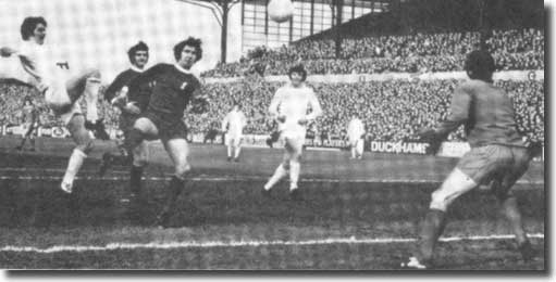 Allan Clarke clips the ball over Ray Clemence to give Leeds the lead