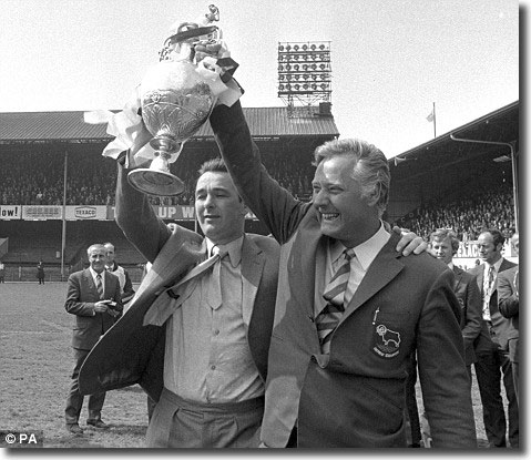 Brian Clough and assistant manager Peter Taylor celebrate Derby's League title win in May 1972