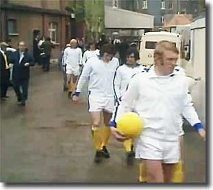 The United players come out from the temporary dressing rooms to face Chelsea