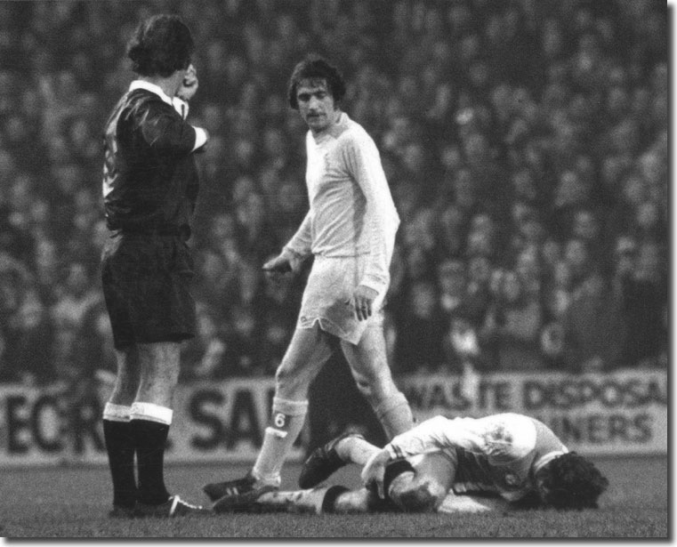 Norman Hunter walks away after exacting some cold eyed revenge on Palace's John Craven during the game on 18 November