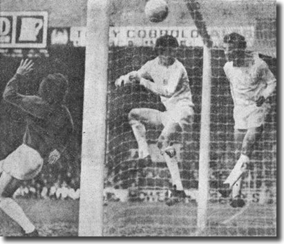 Paul Reaney clears this header from Norwich's David Cross but the ball had crossed the line and the goal was awarded