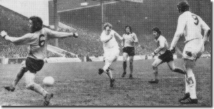 Mick Jones looks on as Billy Bremner thrashes home the only goal of the Cup semi-final against Wolves