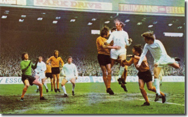 Jack Charlton soars above Wolves' Derek Dougan in the Cup semi-final