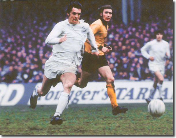 Joe Jordan races away from Wolves' John McAlle - the Scot came off the bench after half an hour to replace Jack Charlton