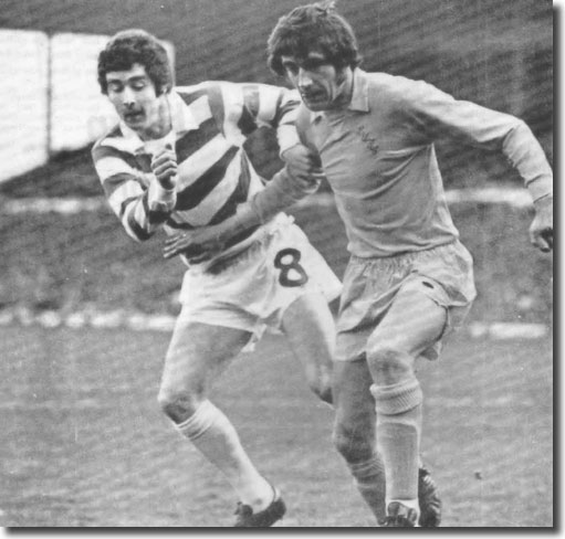 Norman Hunter holds off Celtic's Stevie Murray during Jack Charlton's testimonial match