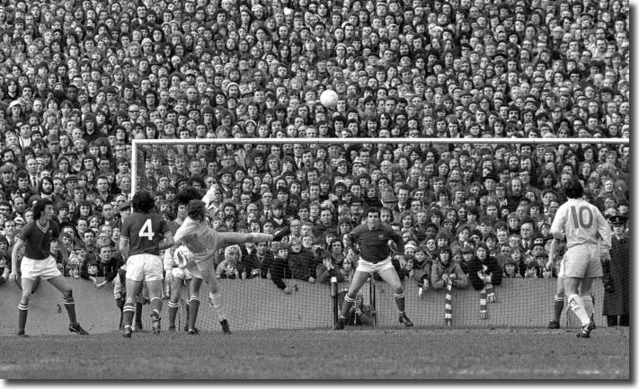 Johnny Giles, the Bristol City defence and a packed Ashton Gate look on as Mick Jones  tried to create something in the first match