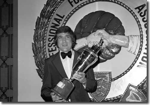 Norman Hunter shows off his Player of the Year trophy