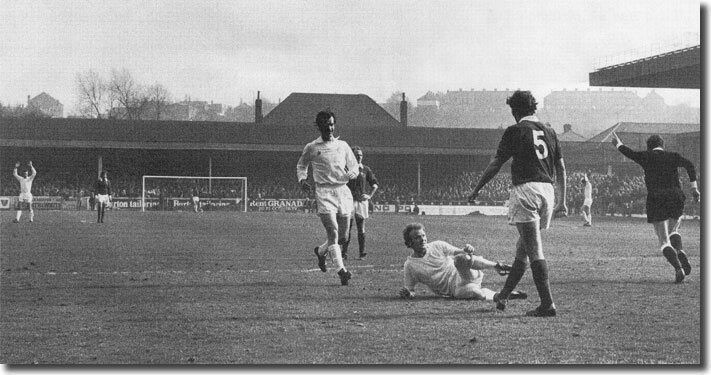 Goalscorer Bremner soaks up the applause as Paul Madeley is first to arrive to celebrate