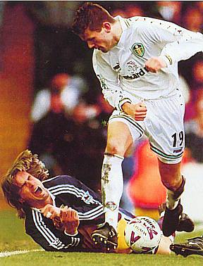 Eirik Bakke was one of a number of  signings at teh start of 1999/2000 - here he gets the better of Tottenham's David Ginola at Elland Road - 12 February 2000 
